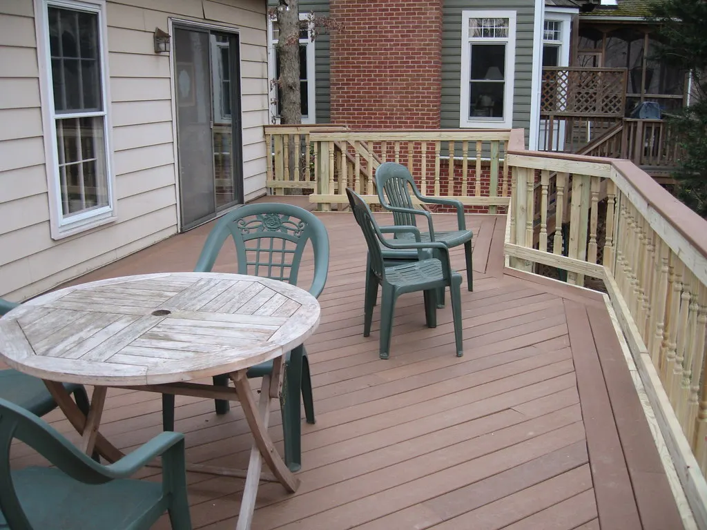Composite deck with railings and patio tables